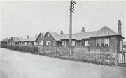 photo of row houses near the factory